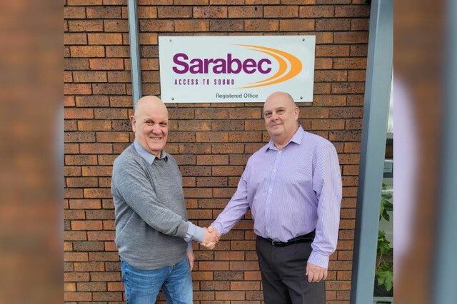 Colin Foxton, former Managing Director of Sarabec, shaking hands with new Managing Director, John Swindale.